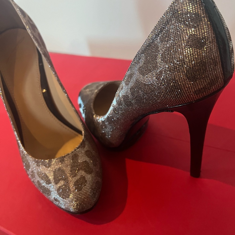 Brian Atwood 4” stilletto. Excellent condition Like new except for the bottoms